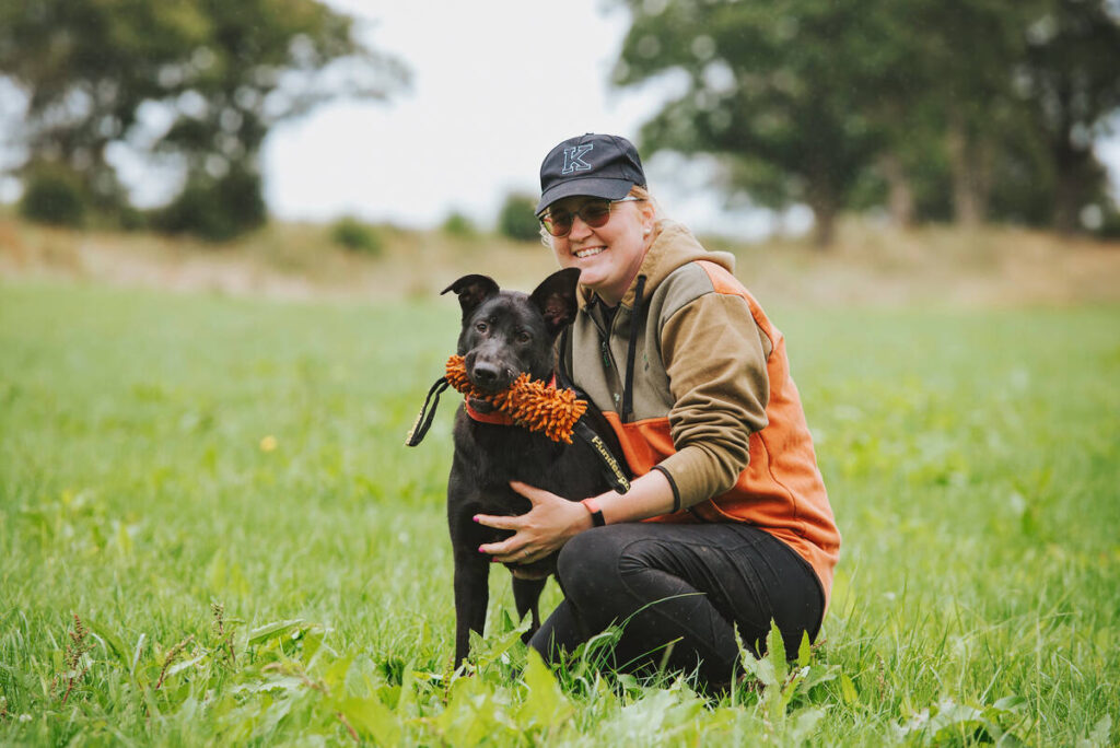 Kathryn with her Malinois x Labrador 